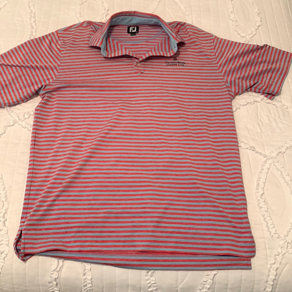 The Woodlands country club golf shirt with American flag on sleeve